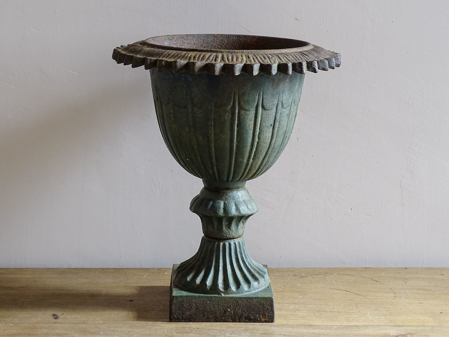 Decorative antique cast iron urn planter with pedestal