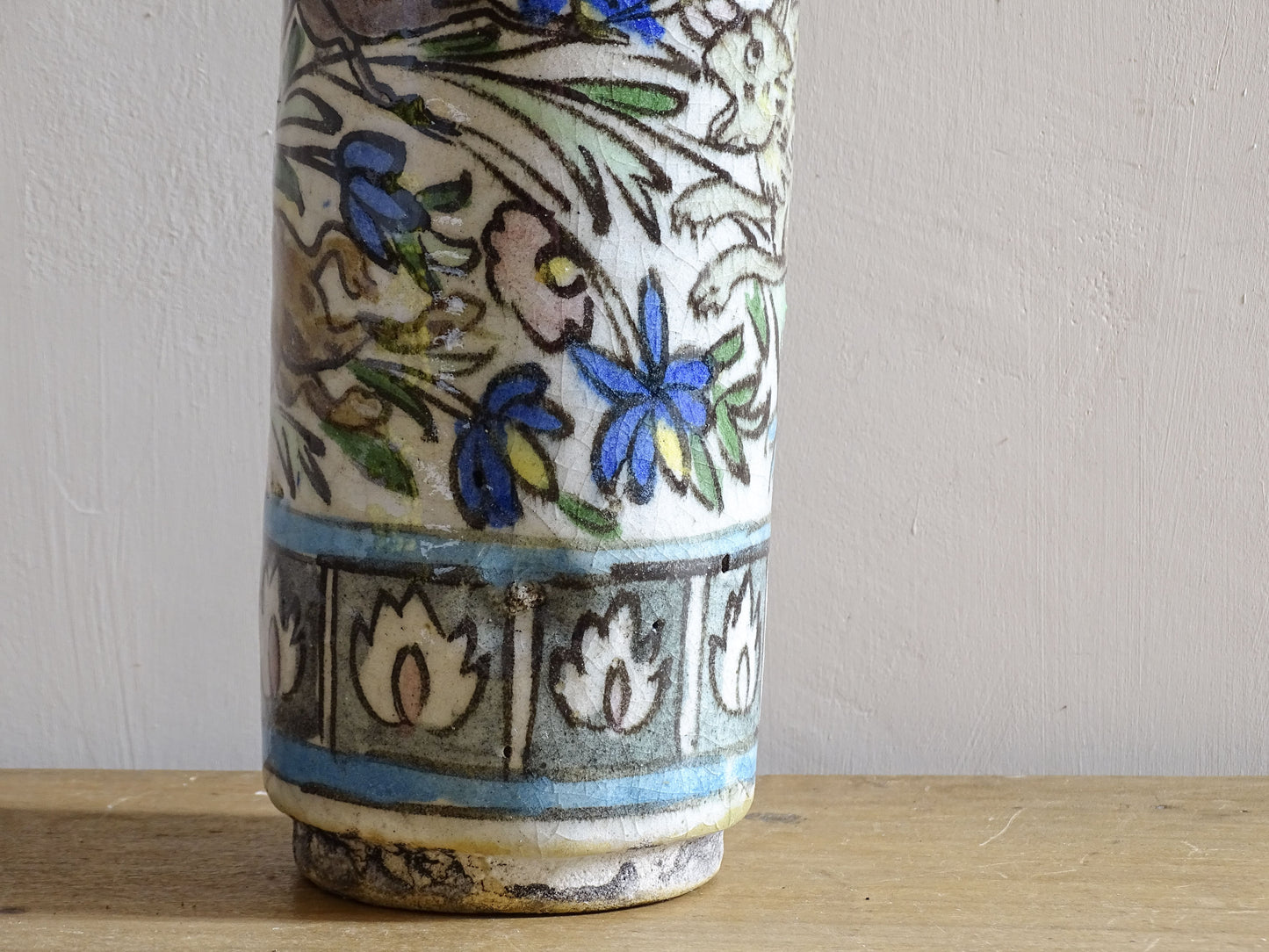 Antique Ottoman style ceramic bottle with hand painted floral design.