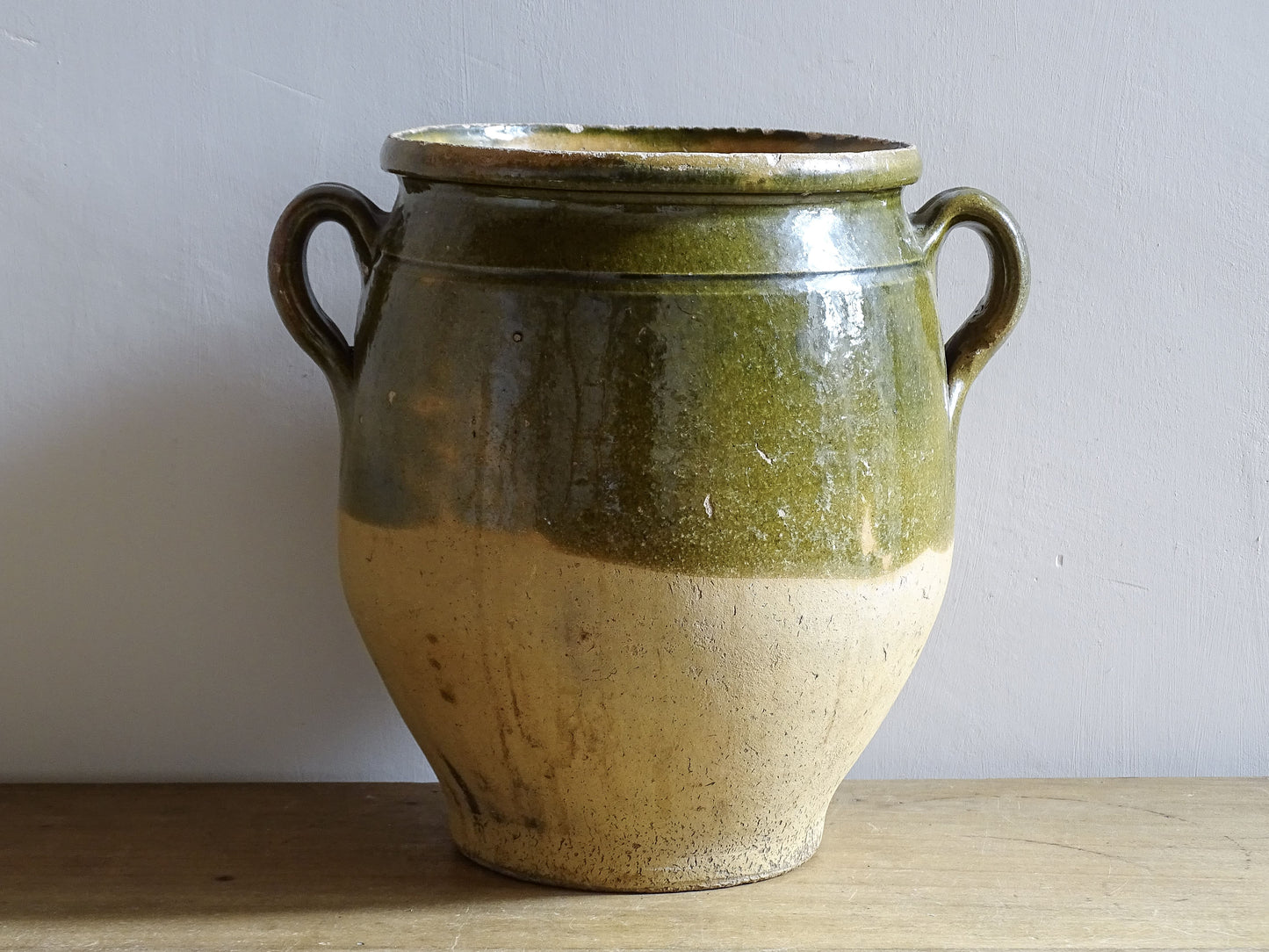 Antique French kitchen pottery confit jar with green glaze