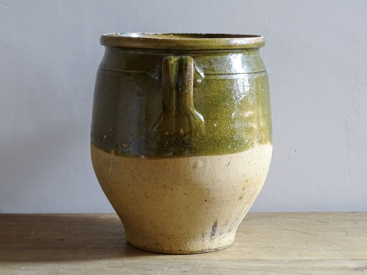Rustic French country pottery confit pot with honey coloured interior