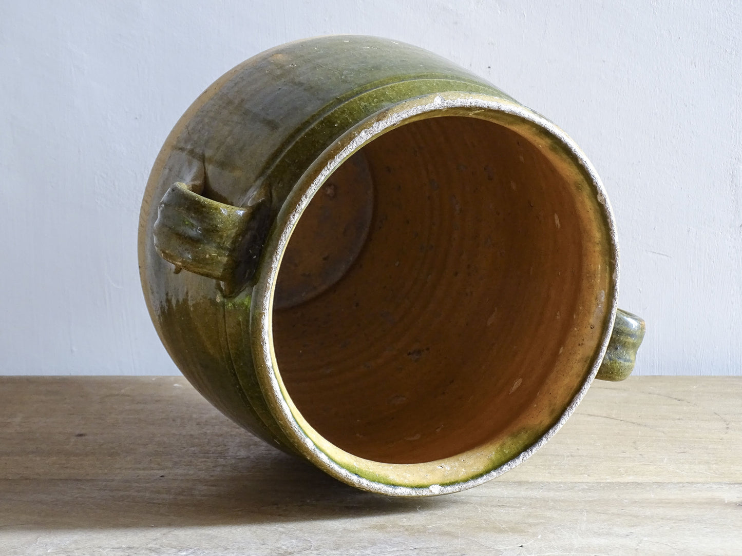 Traditional French confit pot used for preserving duck and goose