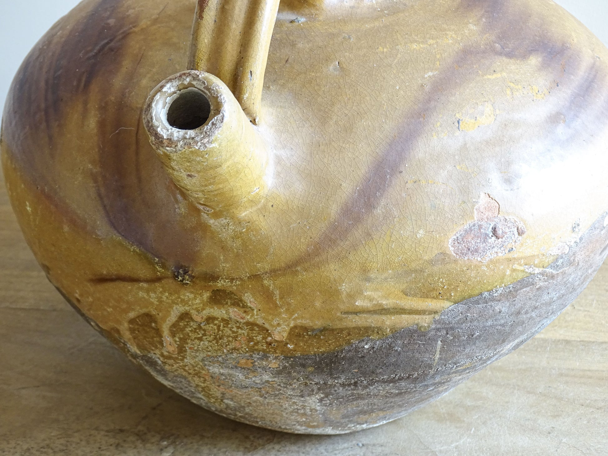 A beautiful French antique ceramic water jug or dourne from the South West region of France. This softly glazed, sculptural terracotta pot dates to the 1900,s.