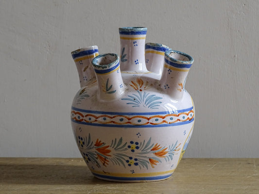 A French vintage tulip vase by Henriot Quimper, featuring traditional Breton decoration and hand-painted detail.