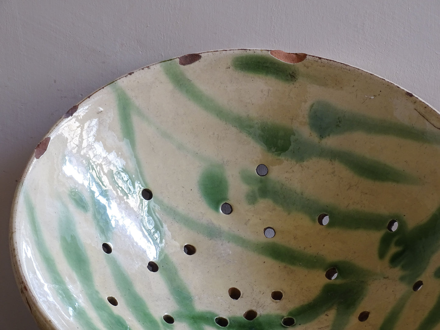 French farmhouse ceramic colander bowl with wide shallow form