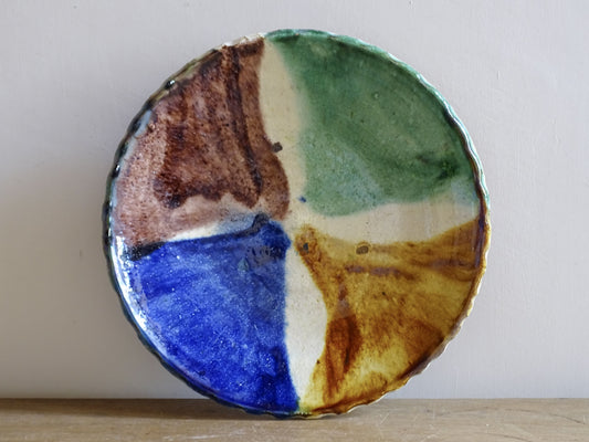 Vintage French pottery dish with abstract green blue ochre glaze