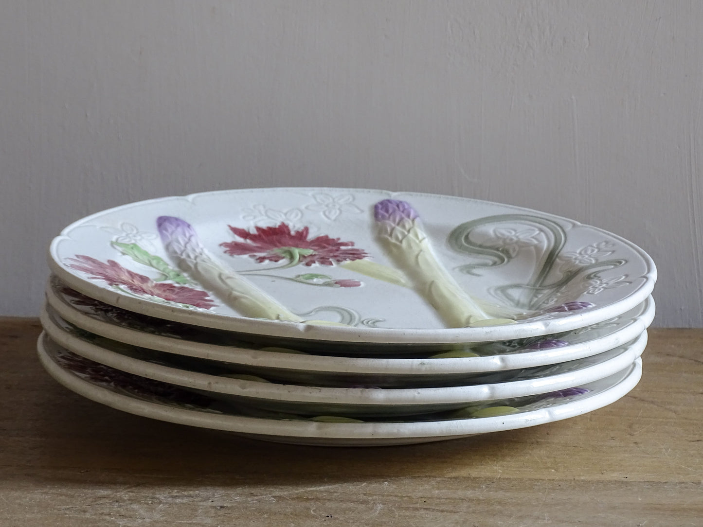 Reverse of antique Saint Clément asparagus plate with maker’s mark