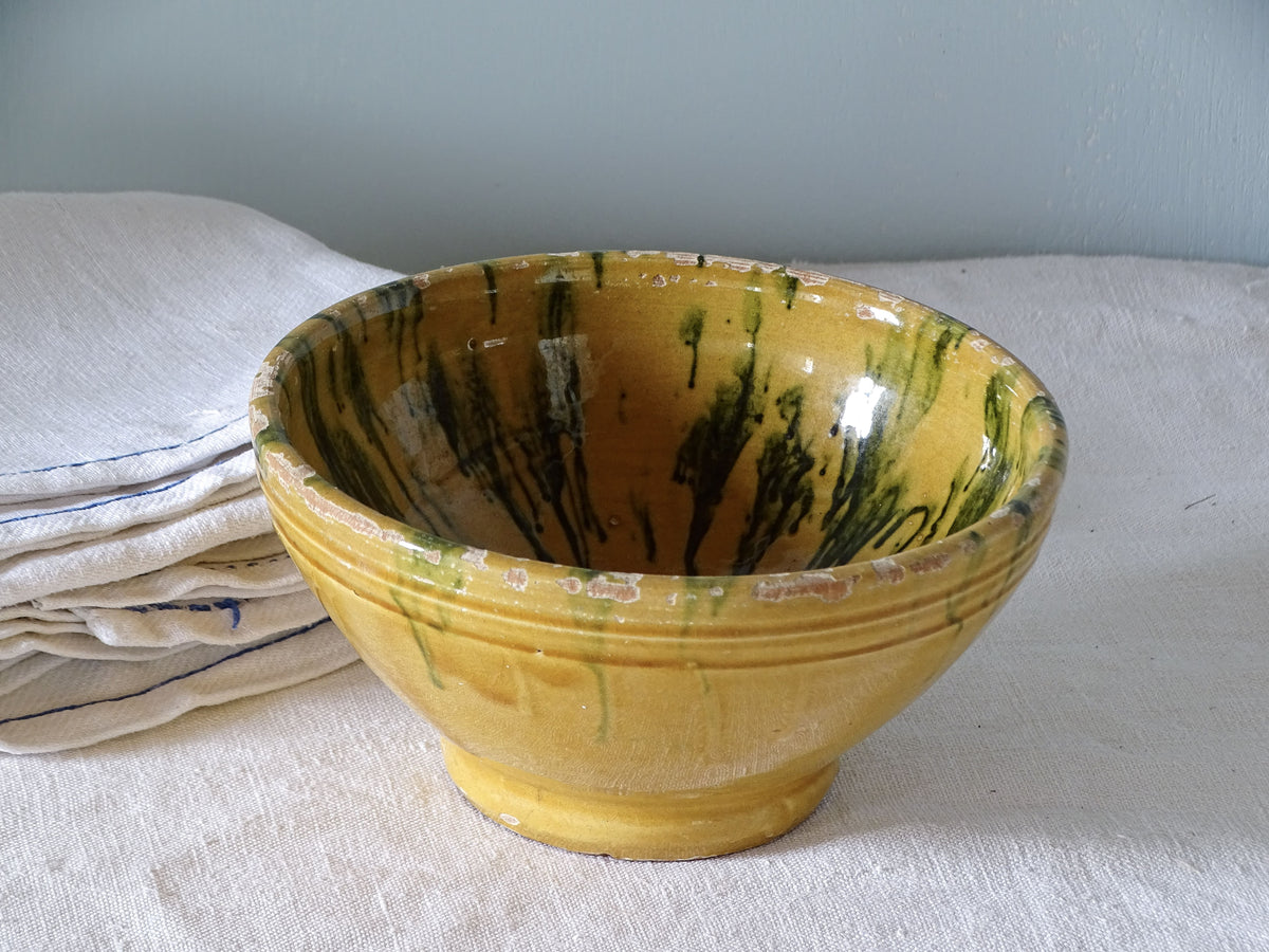 French antique ceramic bowl with yellow and green jaspe glaze