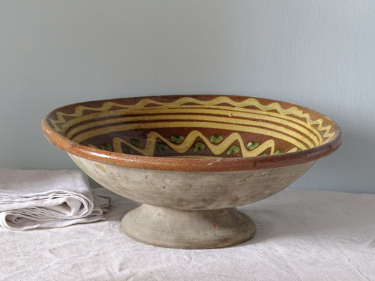 French antique Savoyard pottery bowl with orange glaze and pedestal base