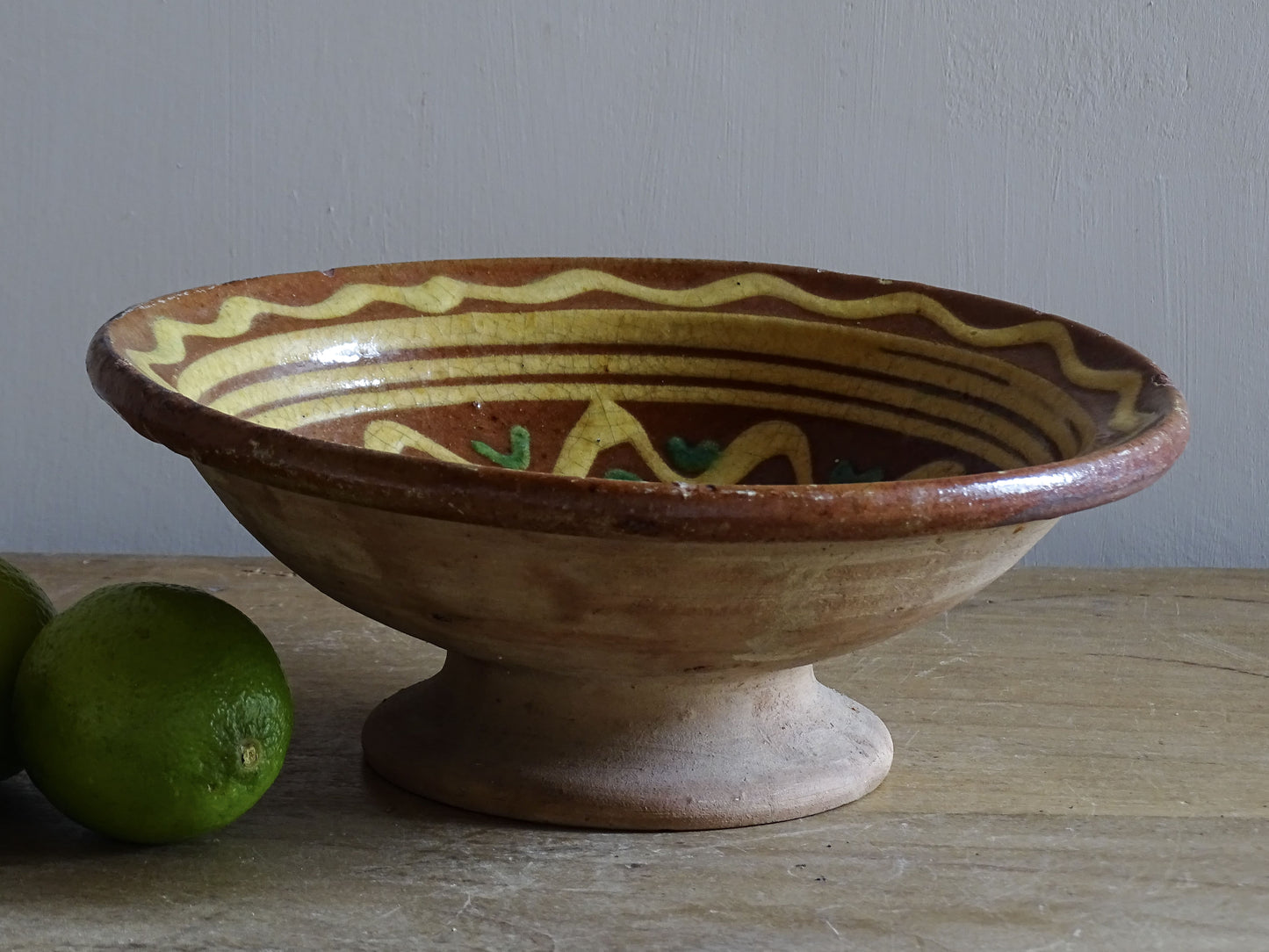French Savoyard antique glazed earthenware pedestal bowl with yellow slip decoration