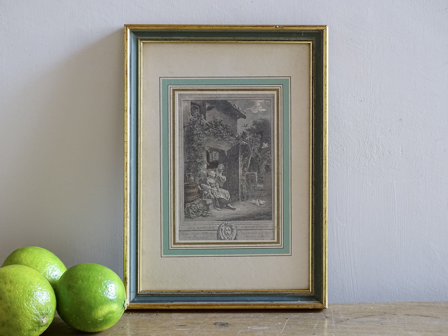 Framed French antique engraving with pale green mount and gilt frame