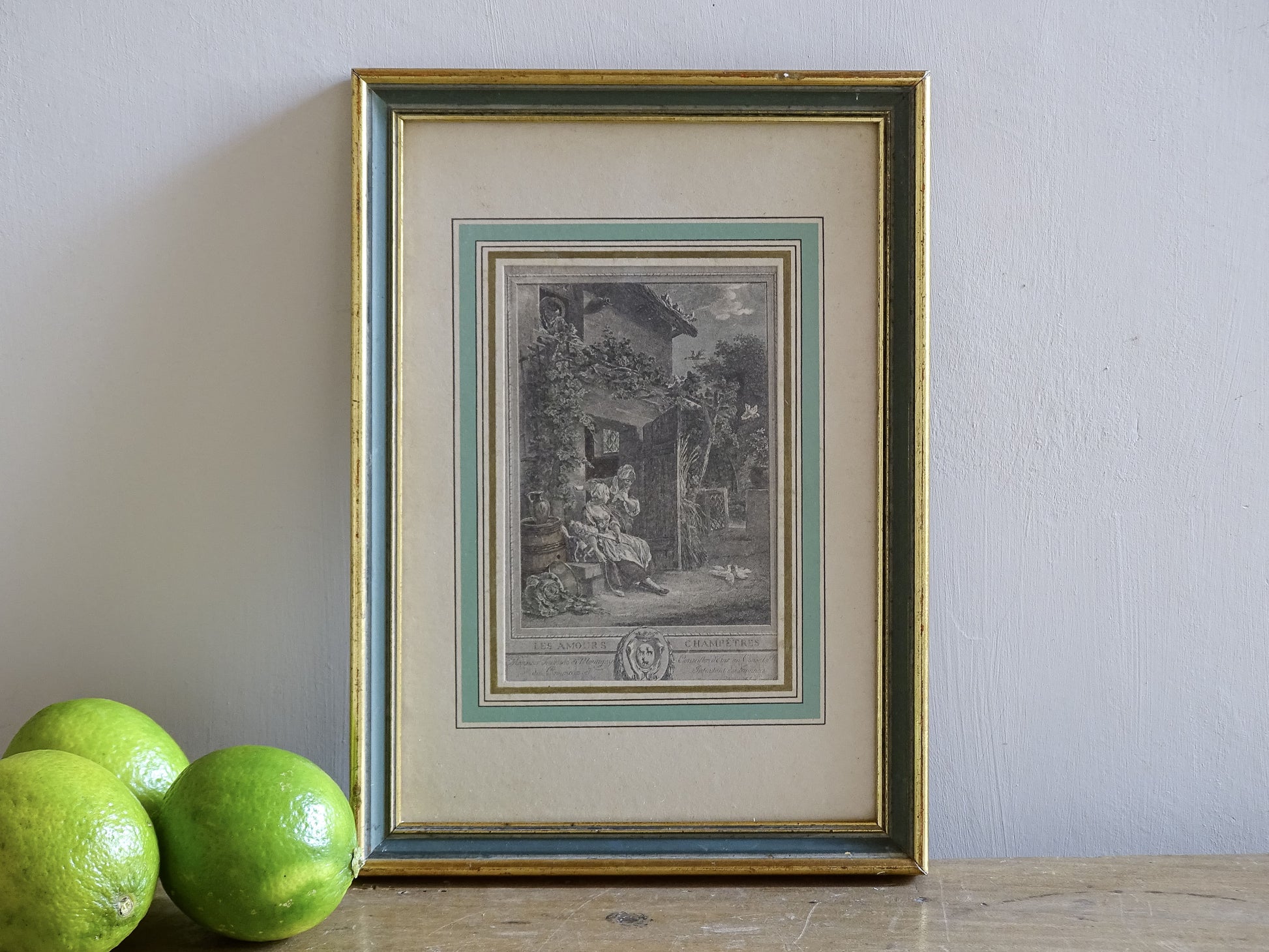 Framed French antique engraving with pale green mount and gilt frame