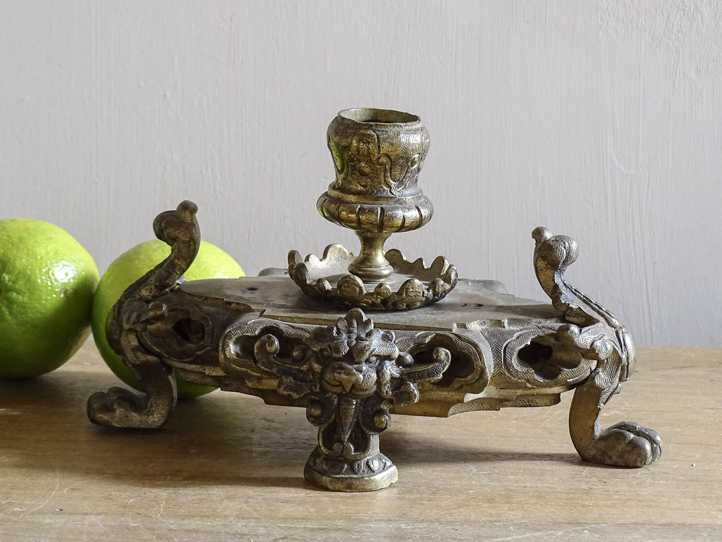 French Napoleon III Rococo Revival metal candlestick fragment with scrolling feet