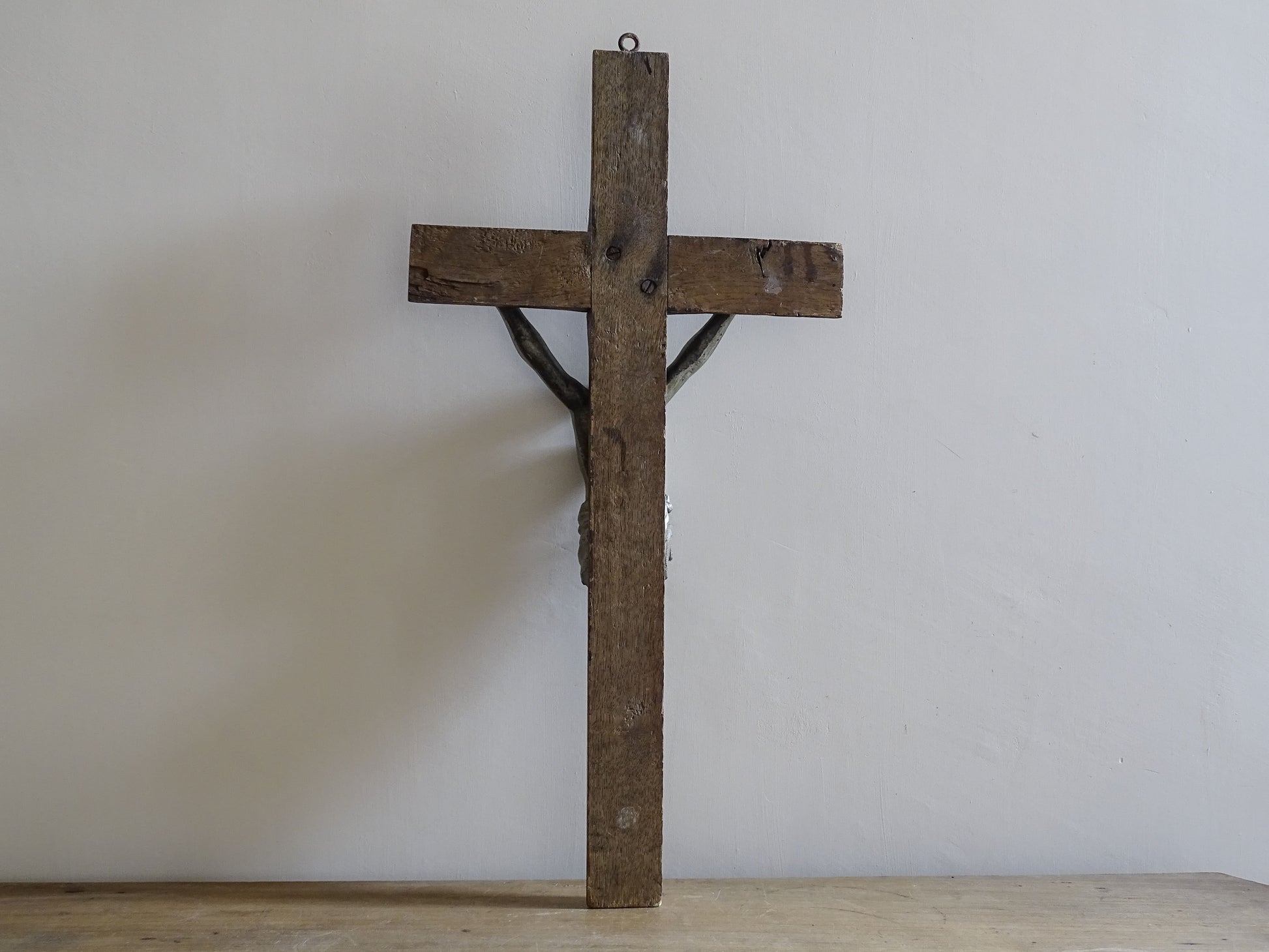 Large French country interior crucifix with aged patina and devotional character