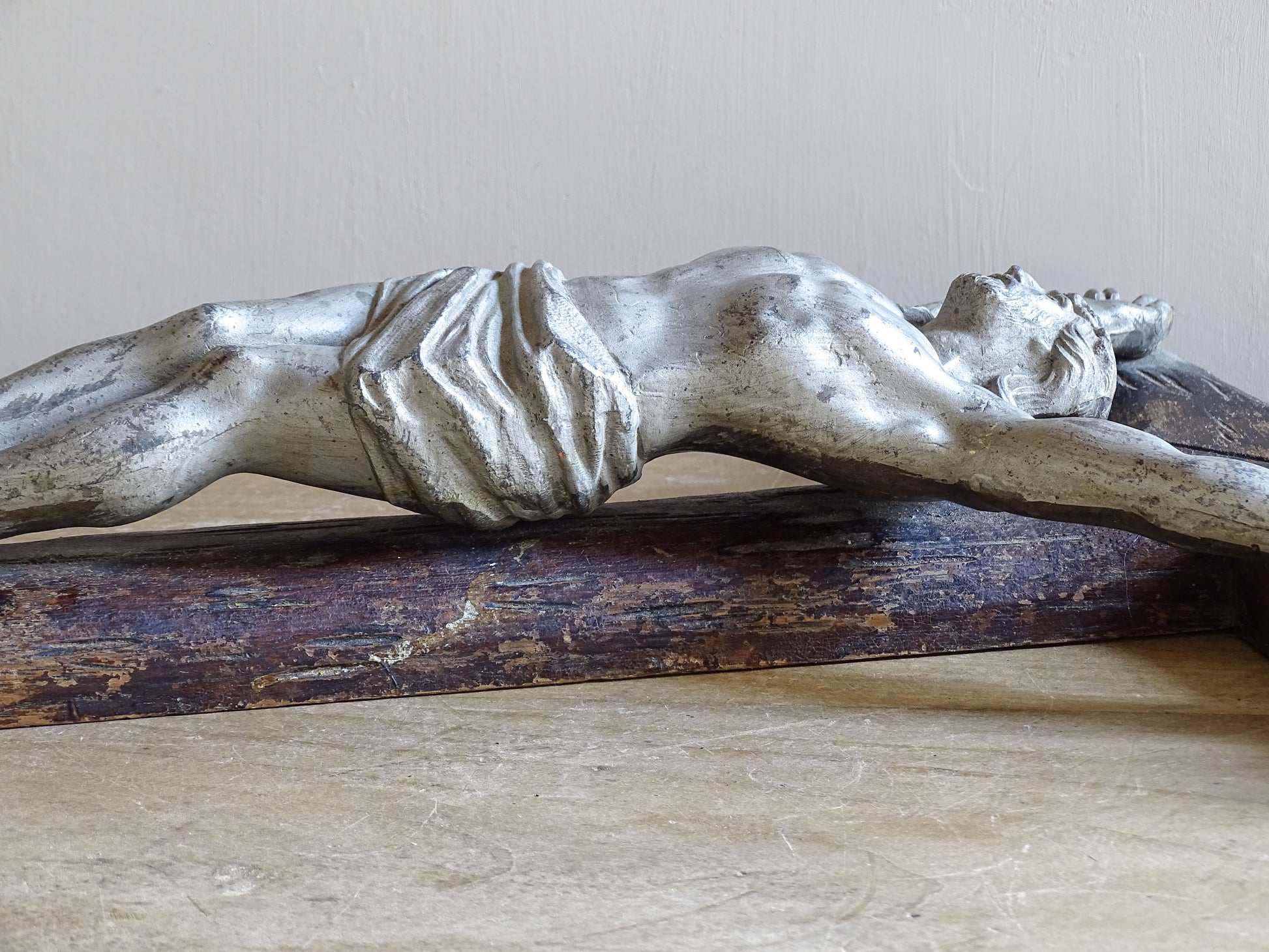 19th century French devotional wall crucifix with rustic carved faux bois cross