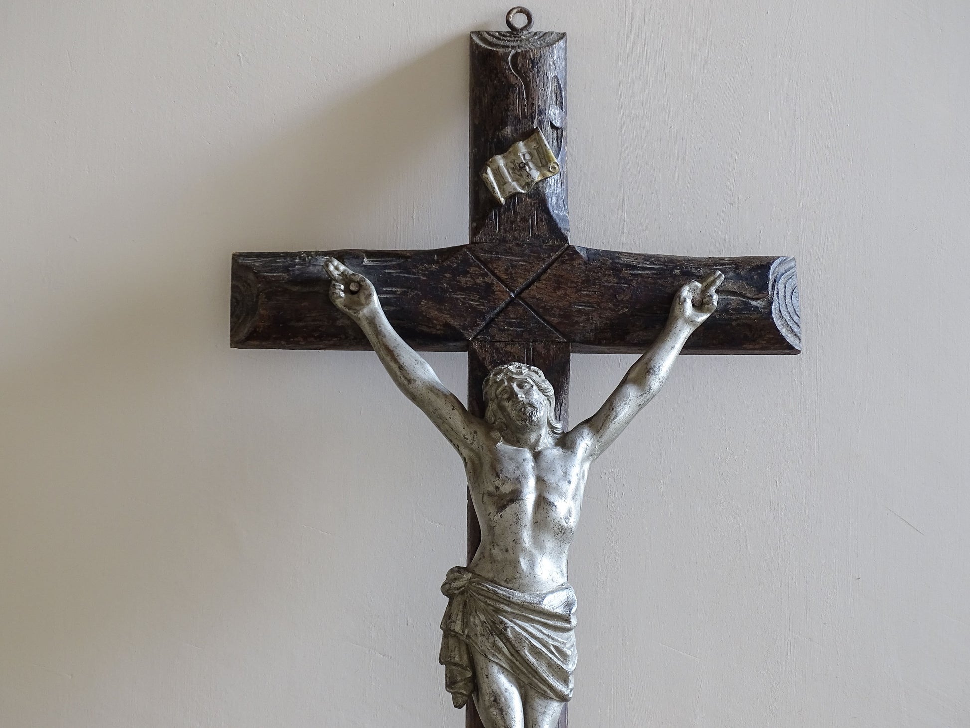 Antique French religious wall decor with sculptural silvered Christ figure