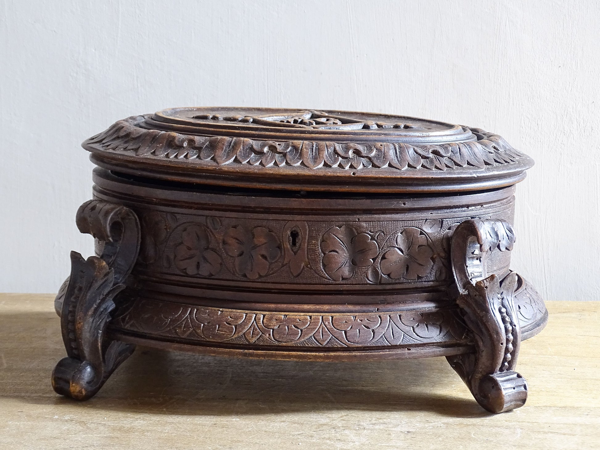 Swiss Black Forest carved jewellery casket with monogrammed lid