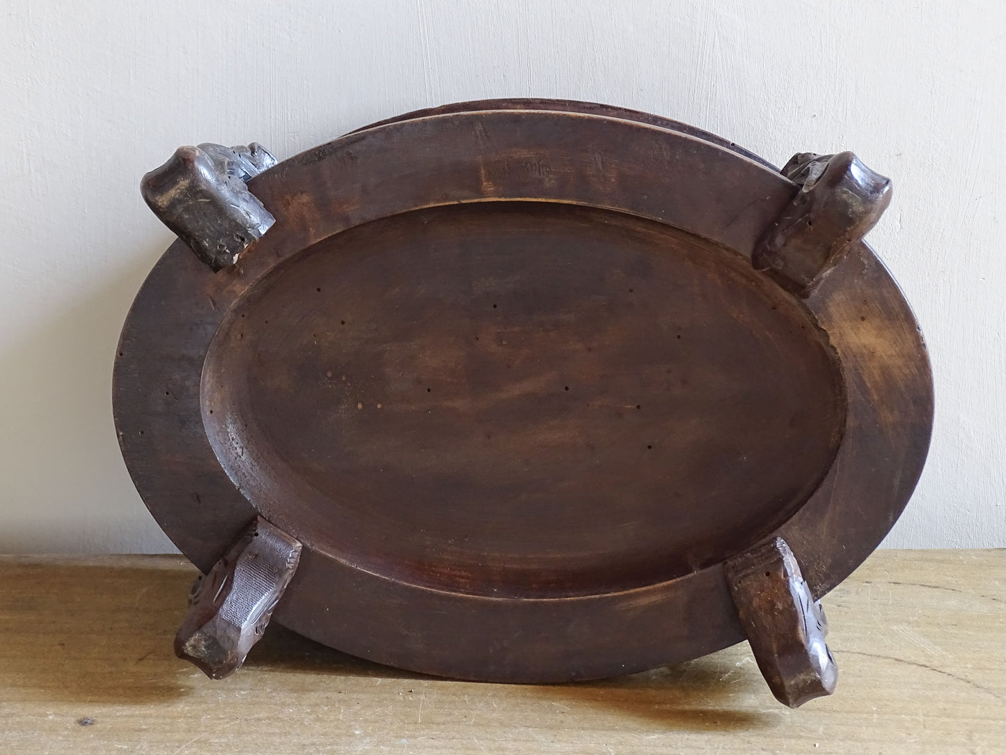 Oval Swiss carved wooden jewellery box on sculptural supports