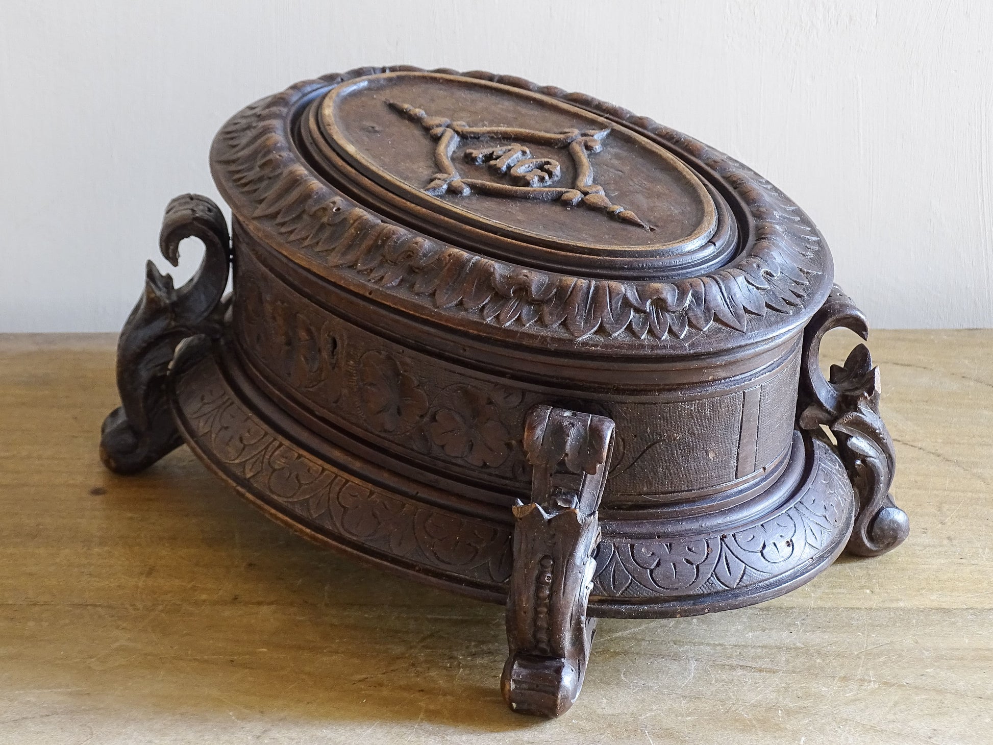 Antique Black Forest casket with upholstered blue interior