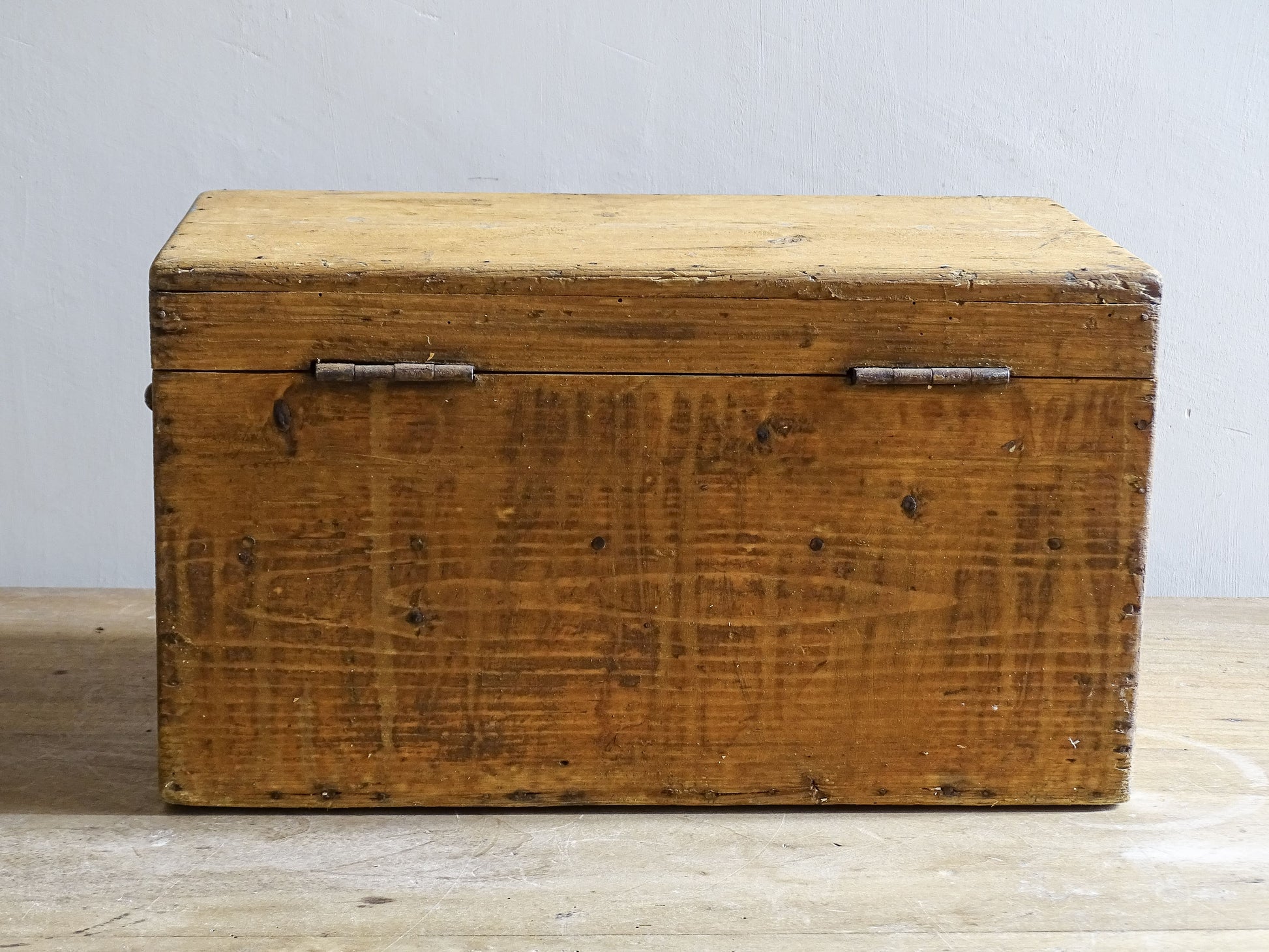 Provincial French wooden utility box with worn honey toned surface
