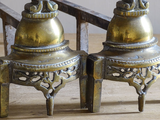 Antique French firedogs with brass fronts and wrought iron supports