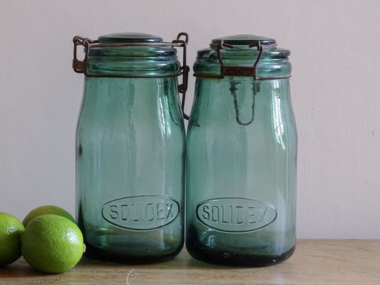 Pair of French vintage aqua glass preserving jars with wire closures