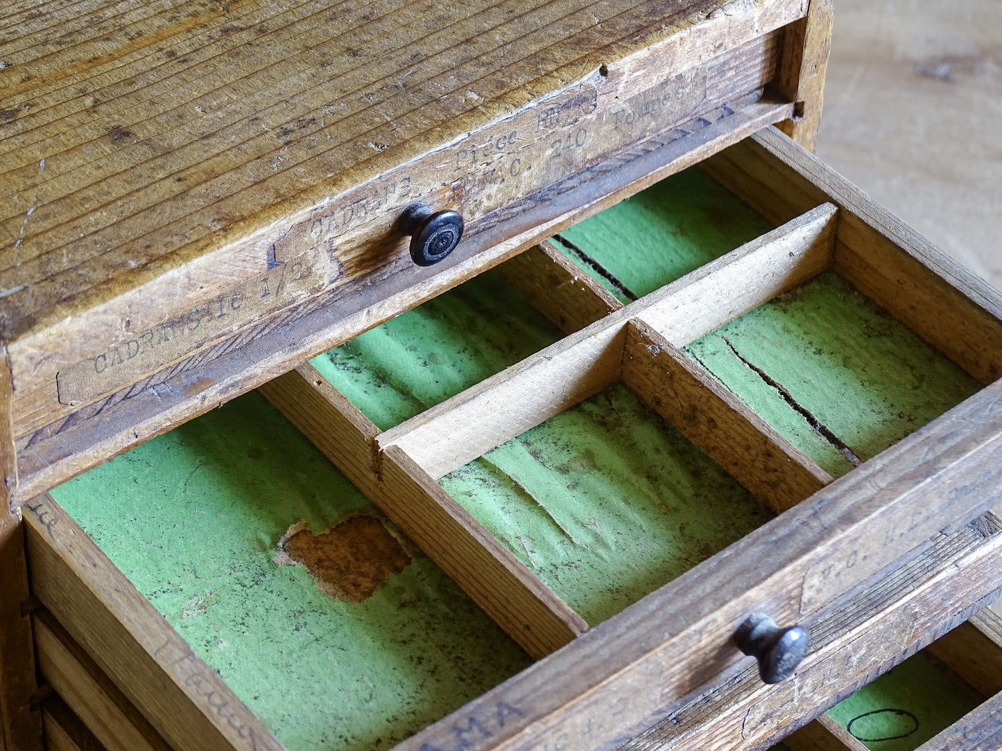 Small wooden watchmaker’s chest with original paper drawer labels