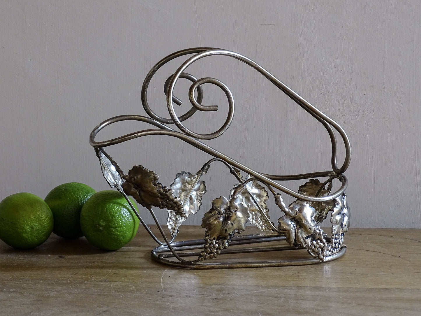French vintage silvered metal wine bottle carrier with grapevine motif and scrolling metalwork