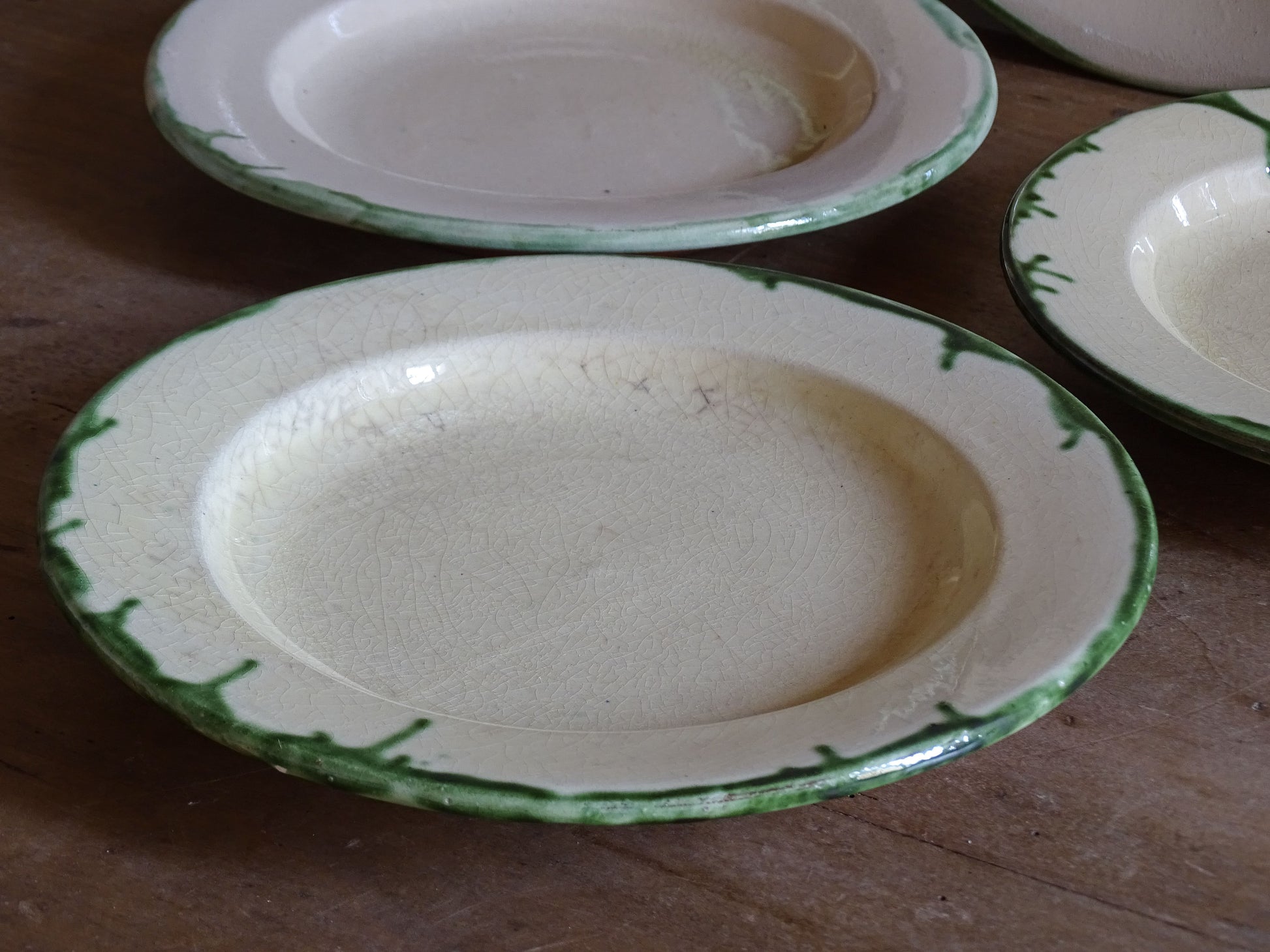 French green drip glaze earthenware plates with terracotta undersides