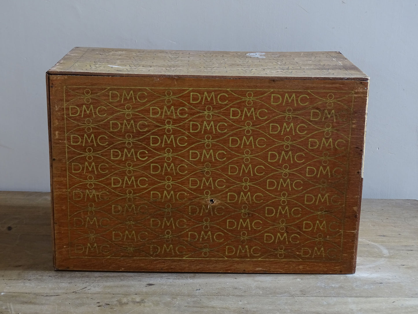 Early 20th century DMC haberdashery cabinet with worn patina