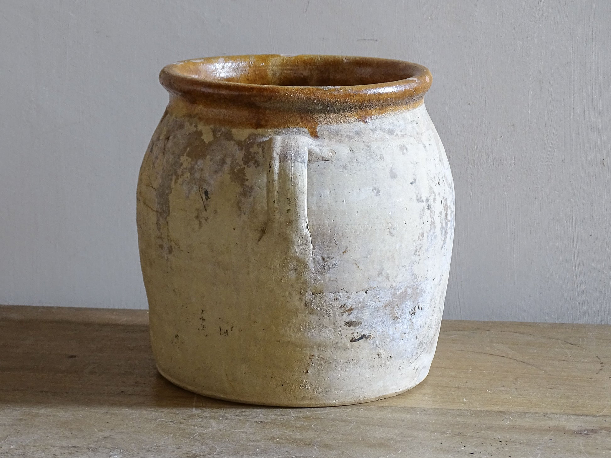 French vintage farmhouse pottery vessel with pale chalky exterior and glazed interior