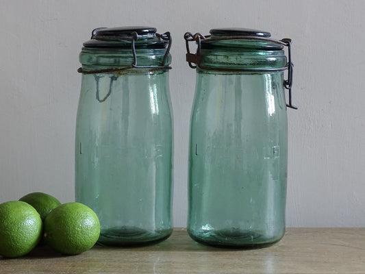 Pair of French vintage L’Ideale preserving jars in blue green glass