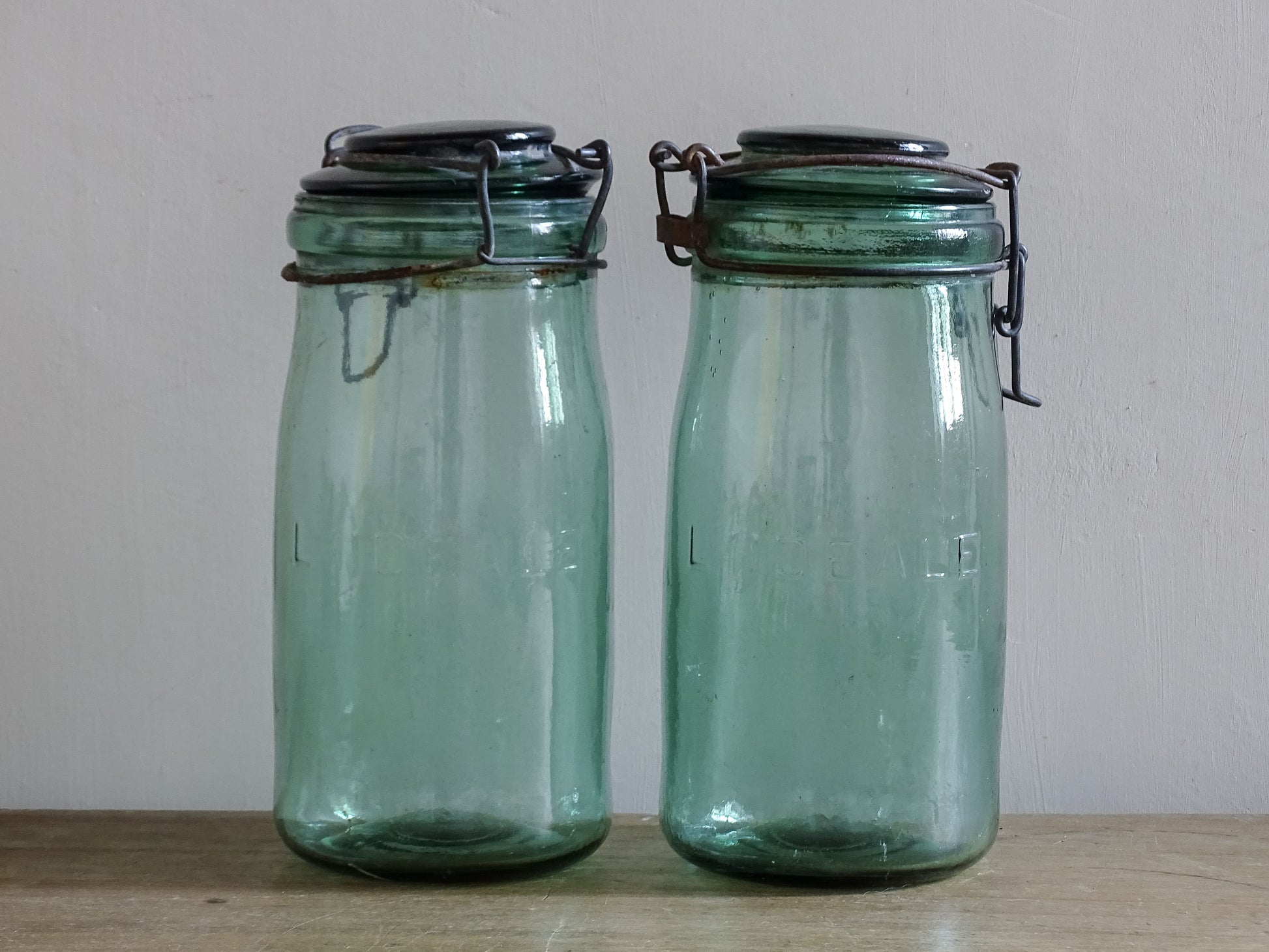 Vintage French pantry jars with embossed L’Ideale lettering