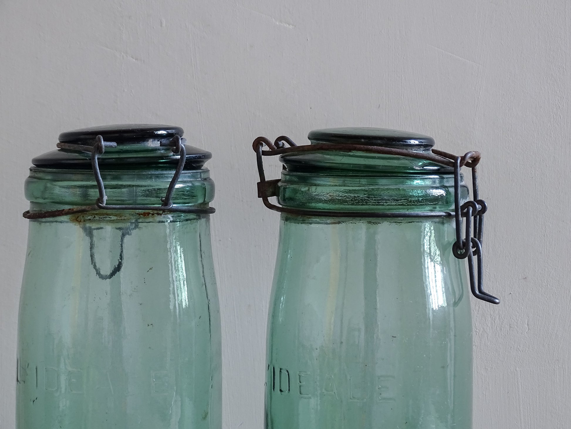French farmhouse glass storage jars with original wire closures