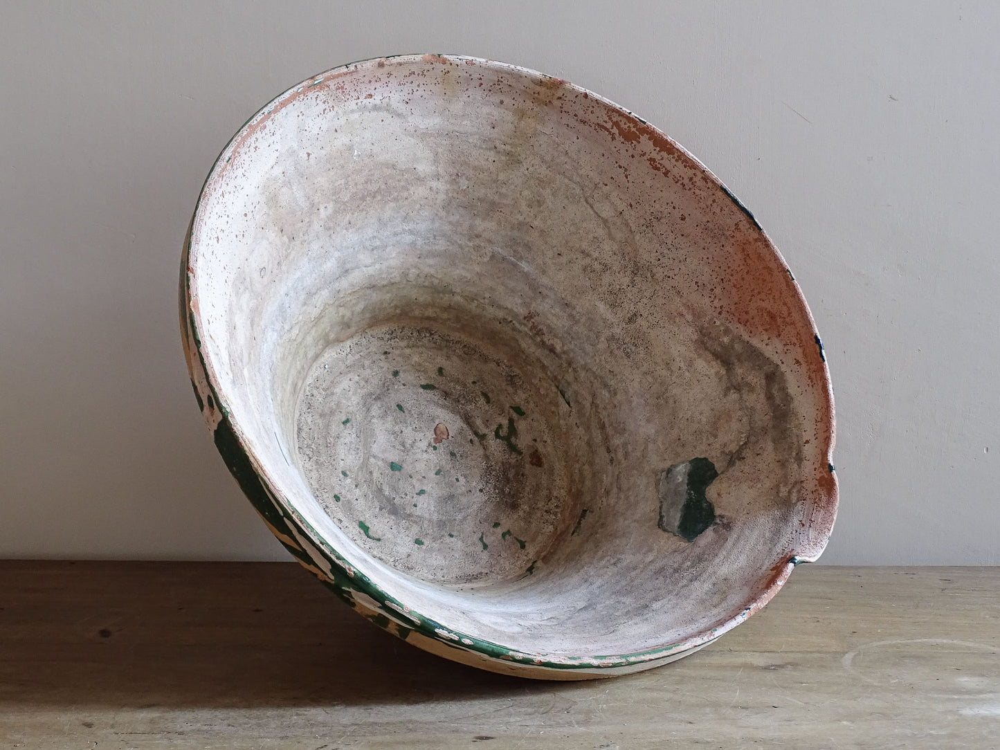 Antique French terracotta tian bowl with aged green glazed rim