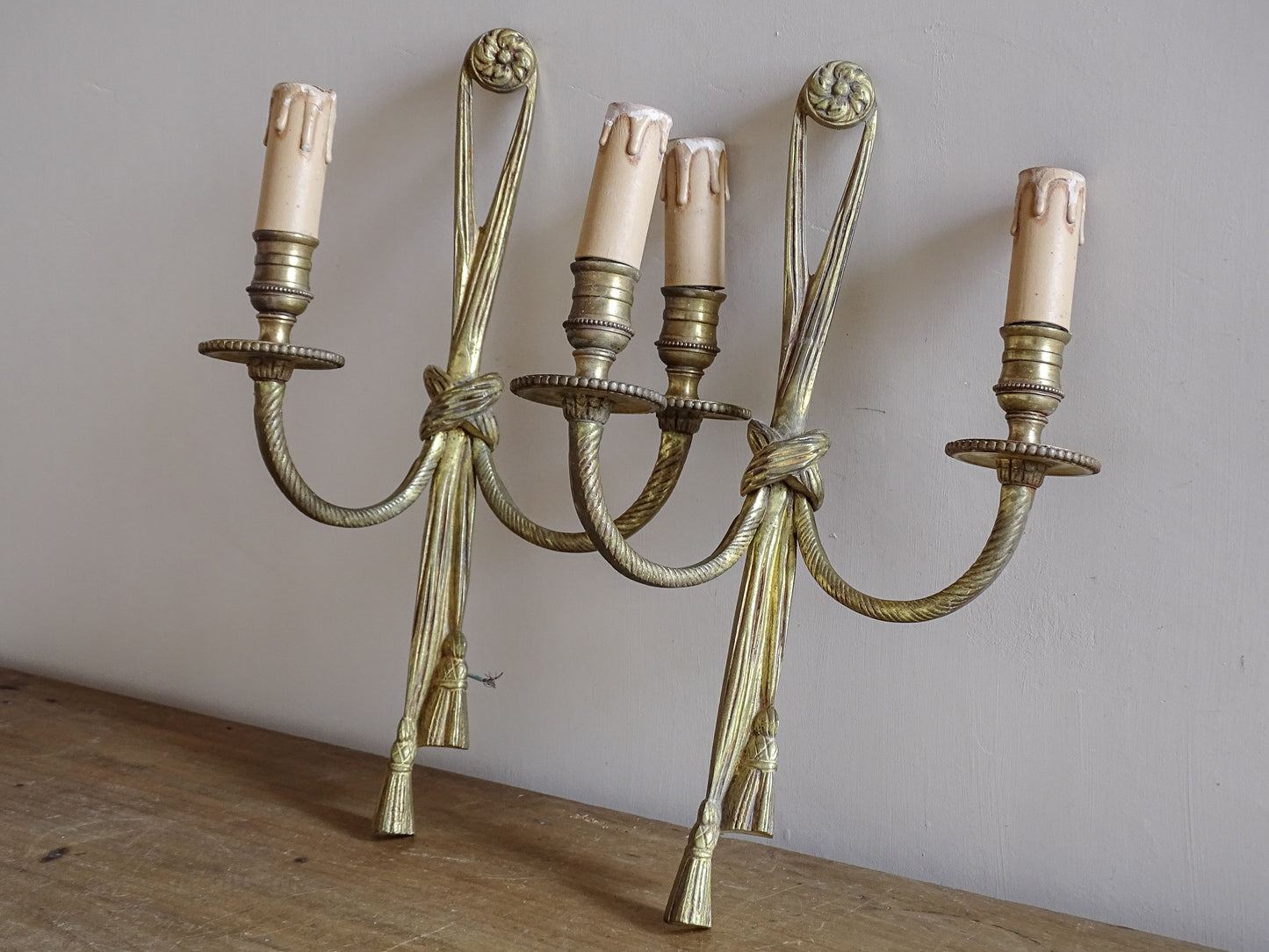 Pair of neoclassical gilt metal wall sconces from France