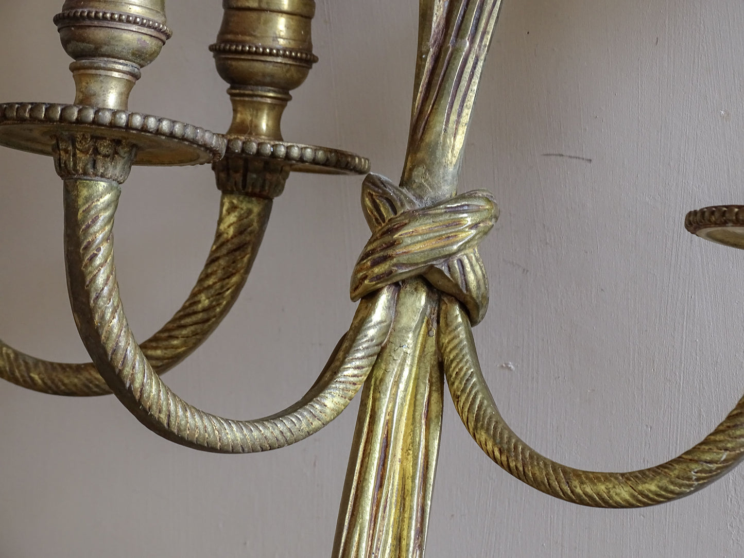 Pair of elegant vintage French wall lights with curved arms