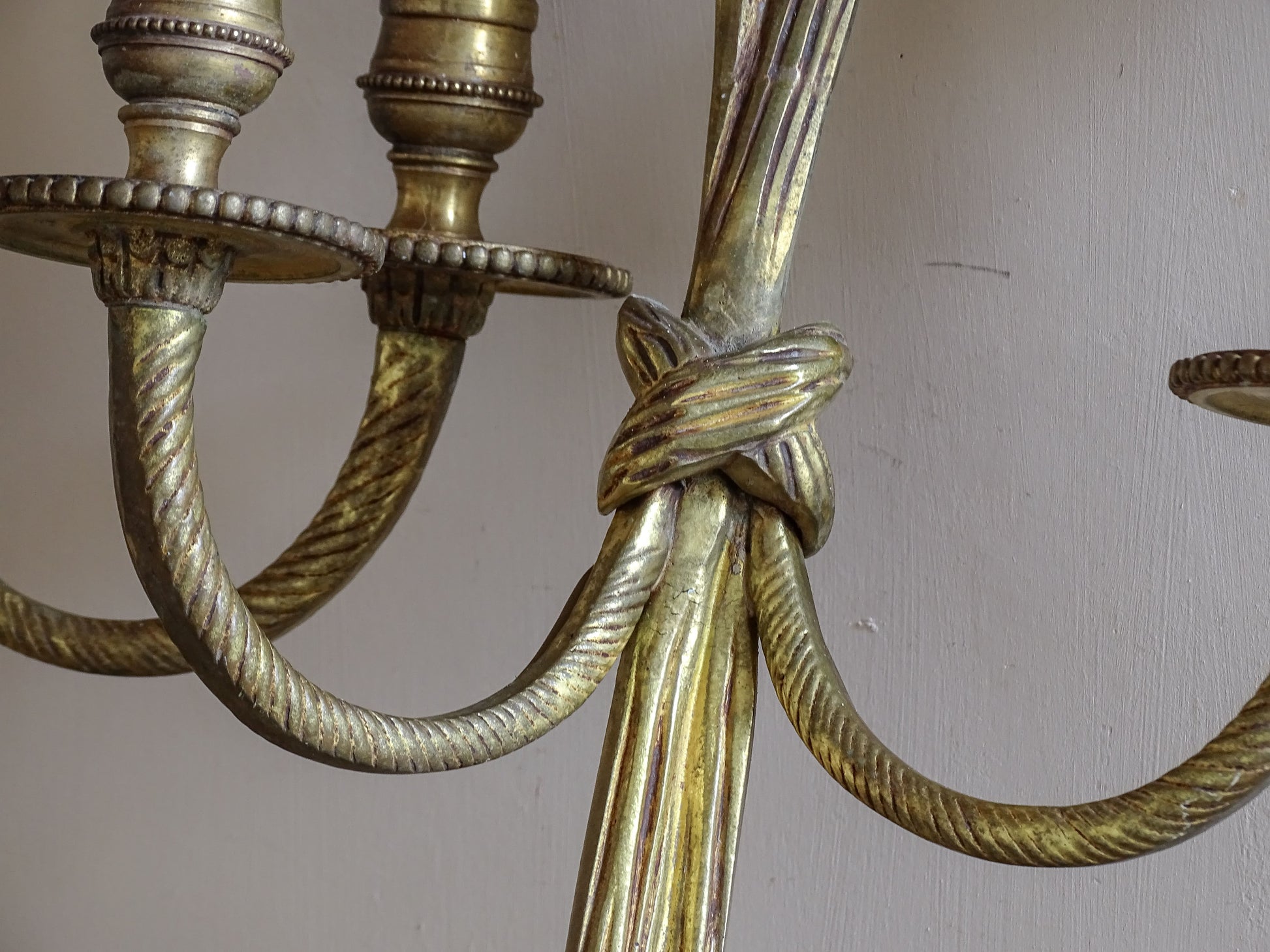 Pair of elegant vintage French wall lights with curved arms