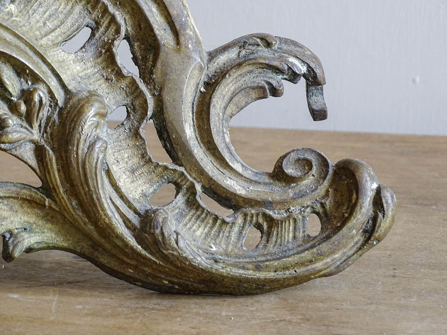 Antique French Rococo fireplace accessories with an aged gilt patina