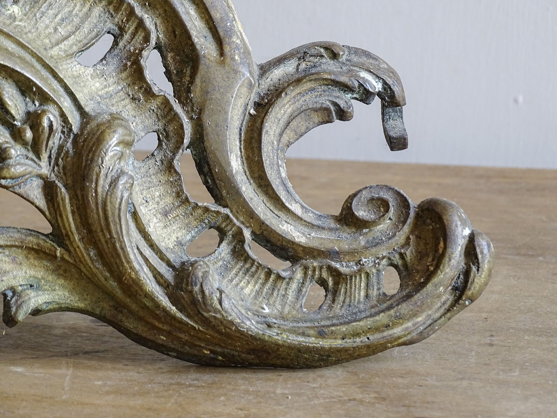 Antique French Rococo fireplace accessories with an aged gilt patina
