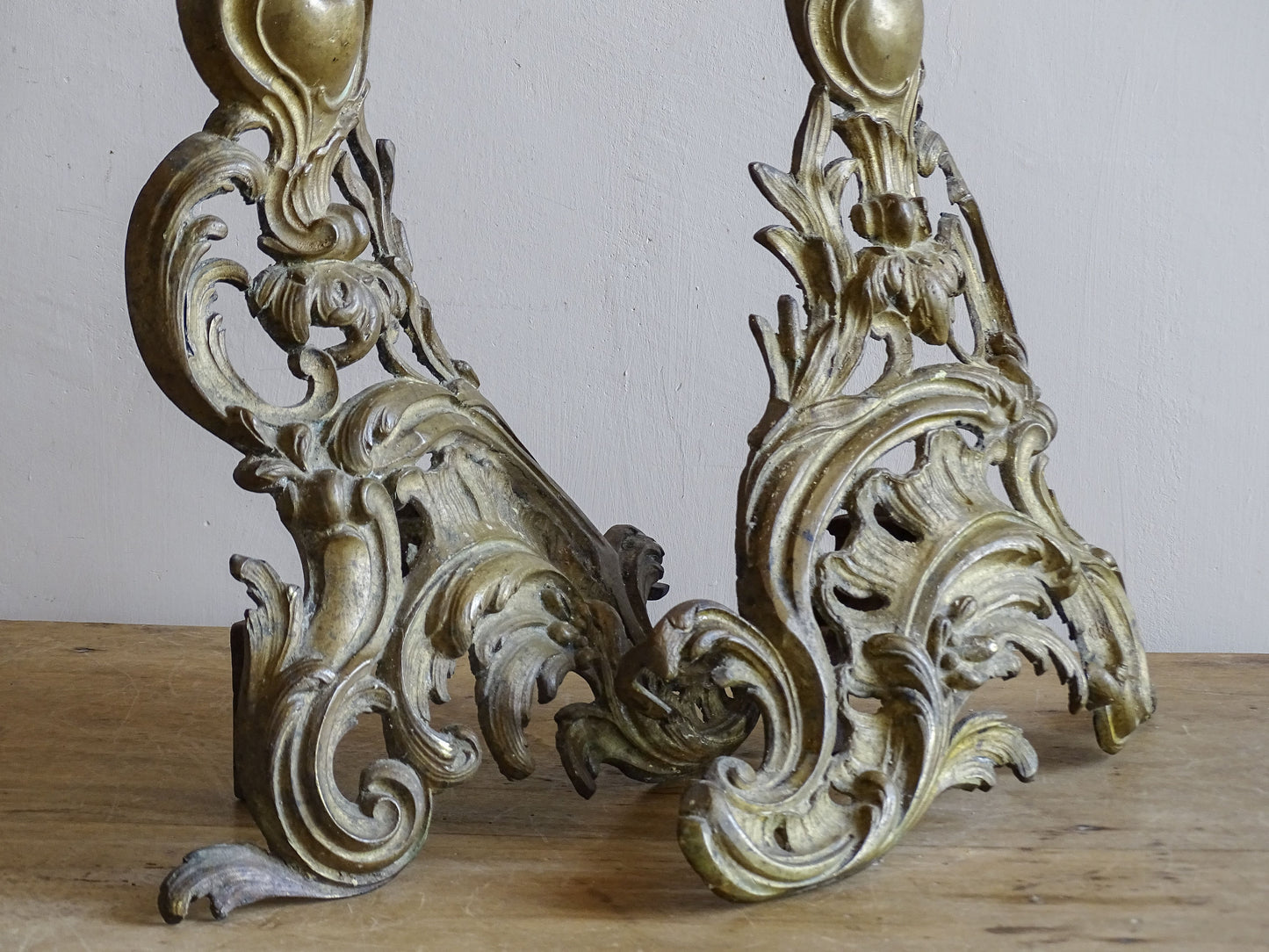 Louis XV-style gilt brass fireplace chenets dating from the 19th century