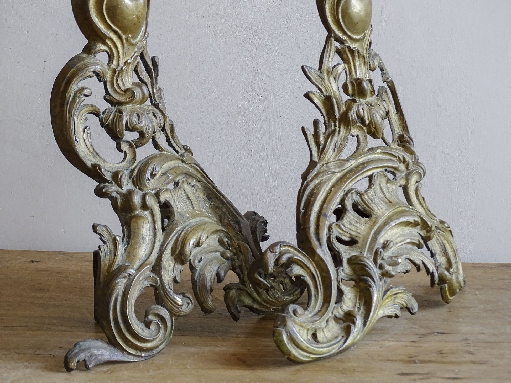 Louis XV-style gilt brass fireplace chenets dating from the 19th century