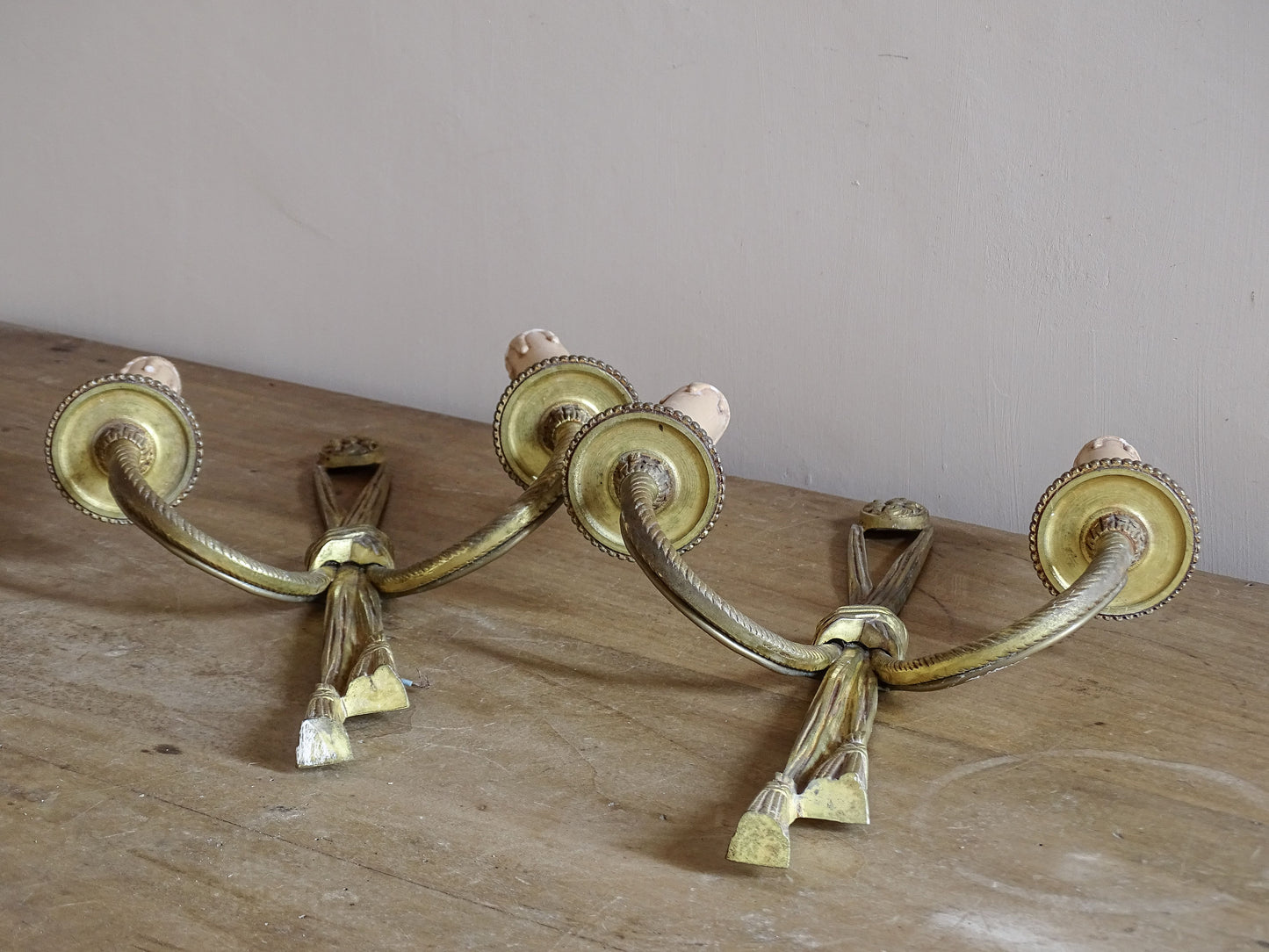French vintage twin arm sconces with ribbon tied tassel motif