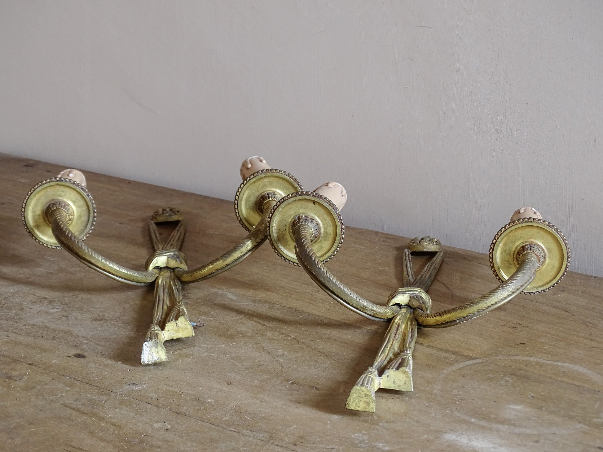 French vintage twin arm sconces with ribbon tied tassel motif
