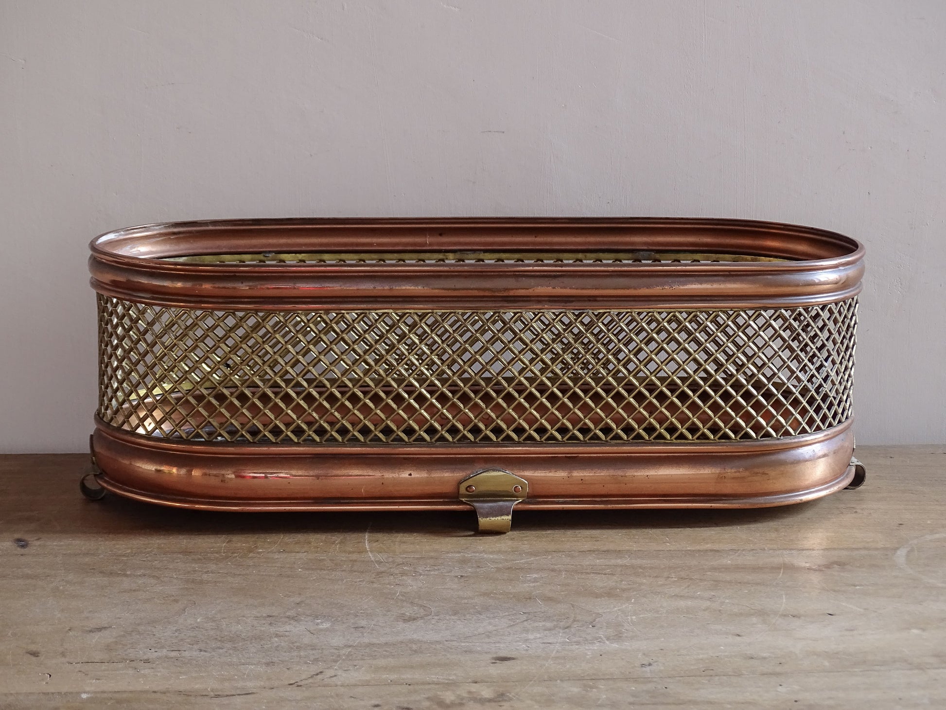 Decorative brass and copper mesh planter for houseplants and herbs