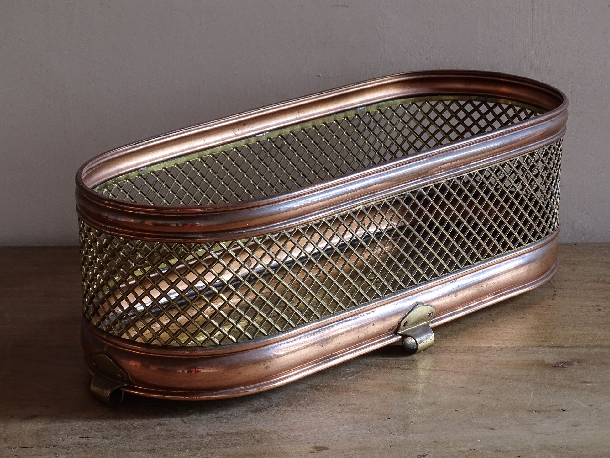 Vintage brass and copper mesh planter with oval mid-century design