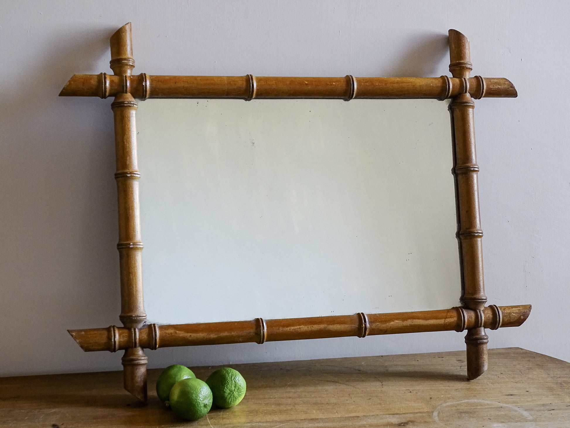 French antique faux bamboo wall mirror with turned wooden frame