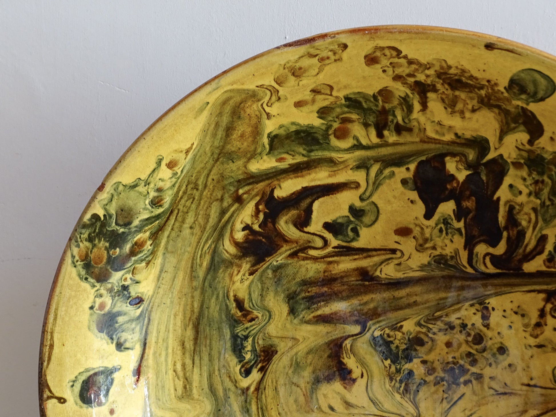 Decorative  earthenware bowl with hand-applied marbled glaze