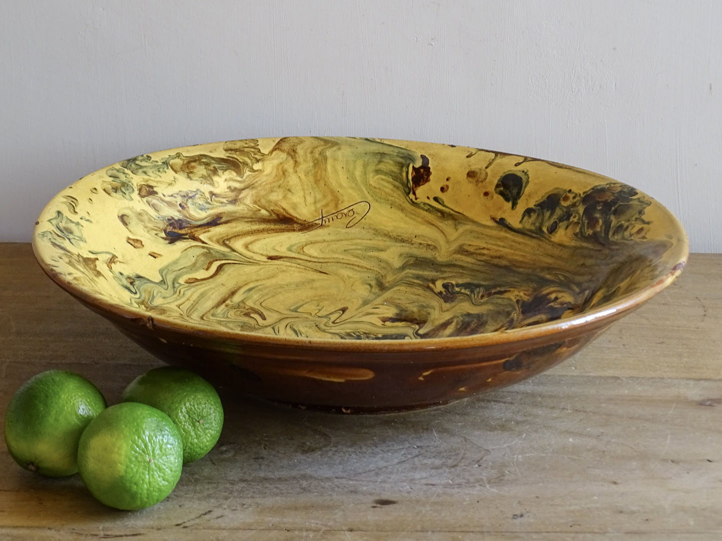 Large vintage French pottery serving bowl with marbled glaze