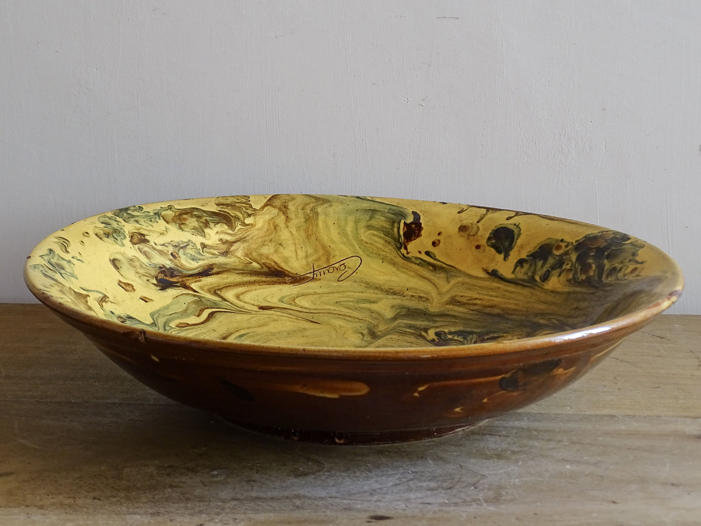 Vintage  ceramic serving bowl with marbled interior