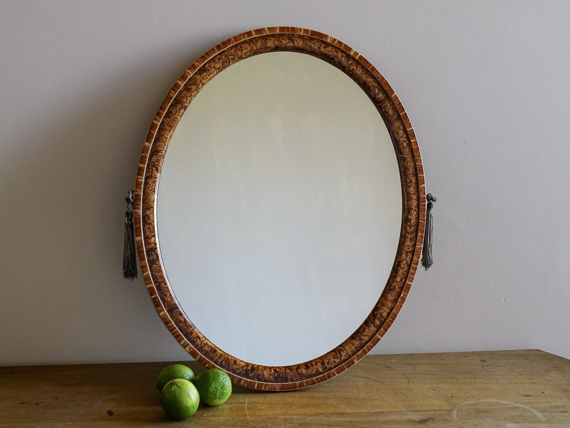 French vintage oval burr walnut veneer mirror with richly figured wood frame